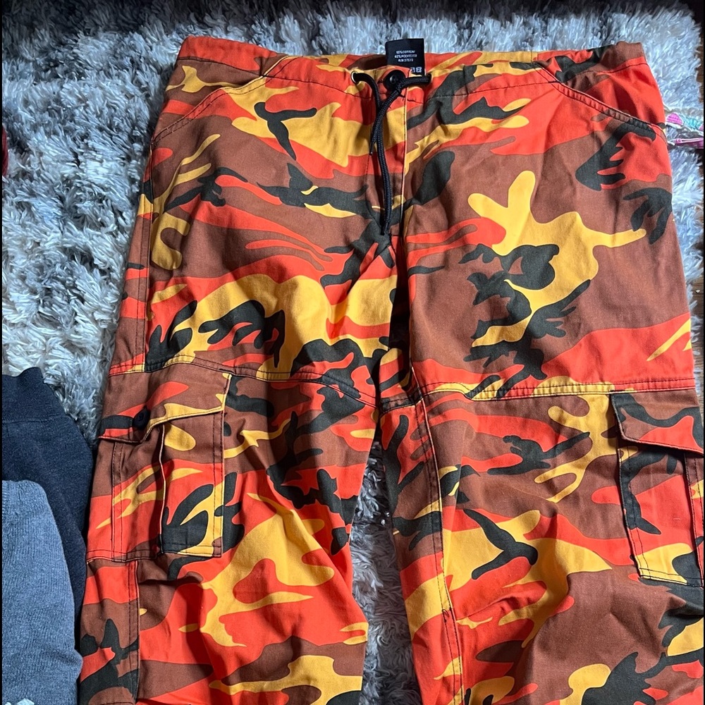these are orange camo and they go to ankle length. great condition
